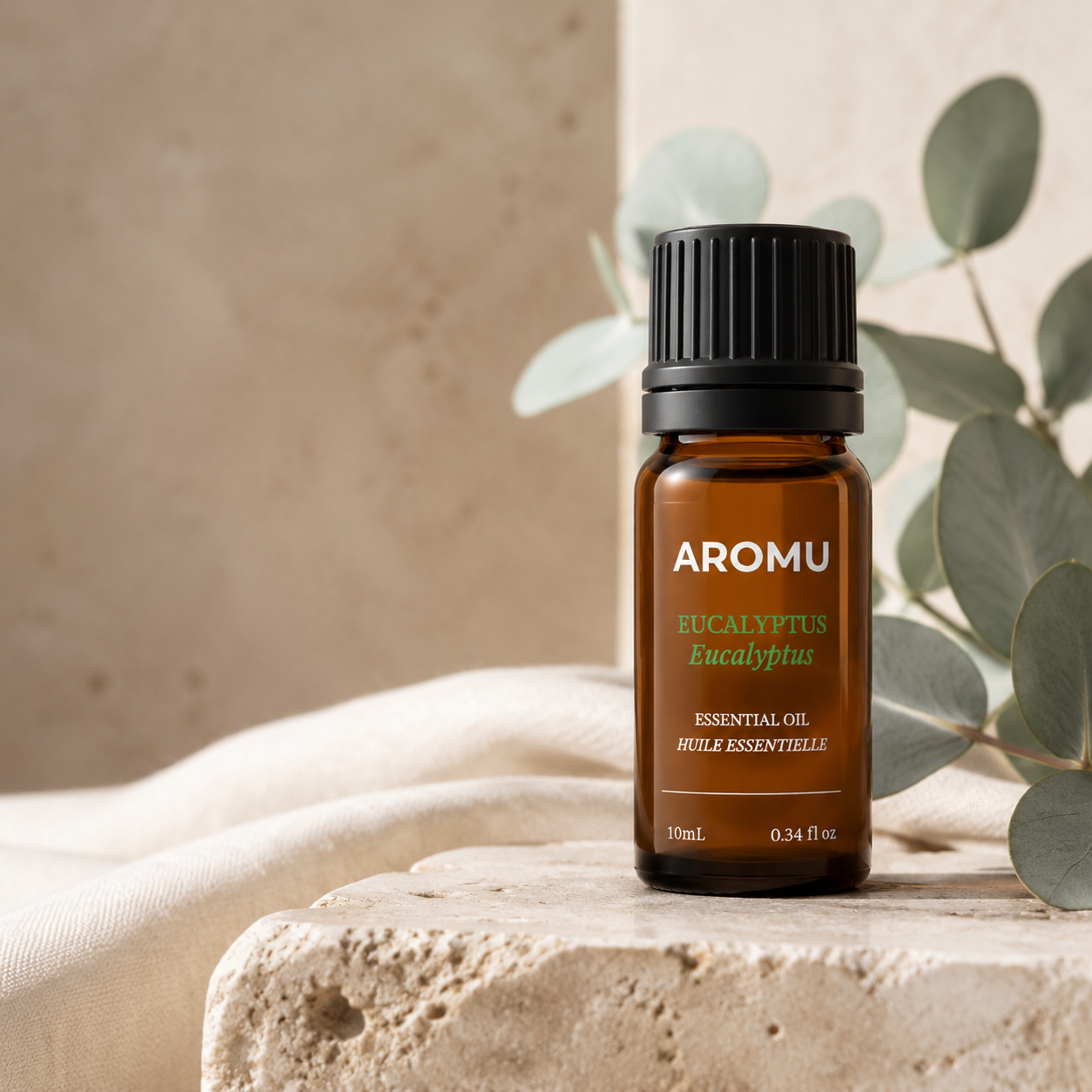 AROMU Eucalyptus Essential Oil in warm natural light