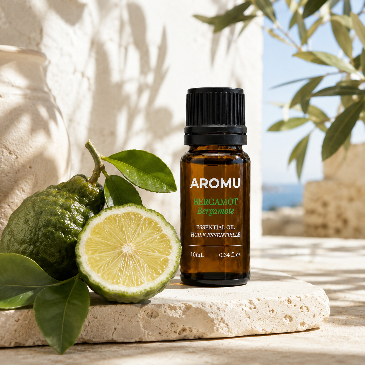 AROMU Bergamot Essential Oil with fresh bergamot fruit and leaves