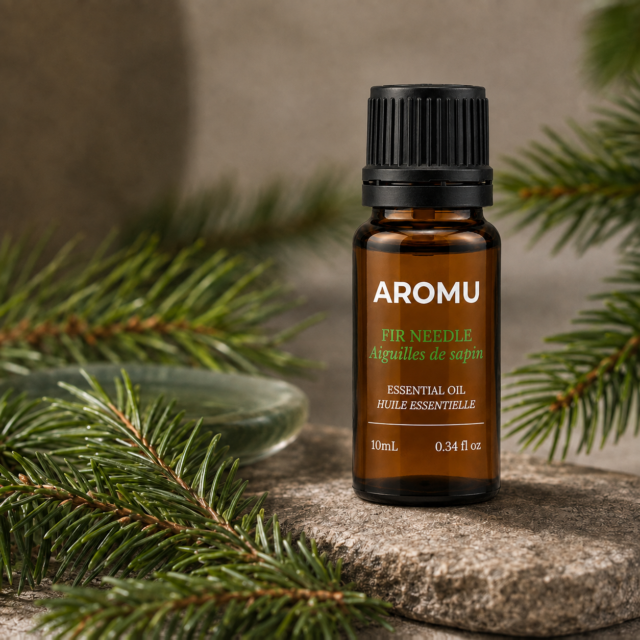 AROMU Fir Needle Essential Oil with fresh evergreen branches