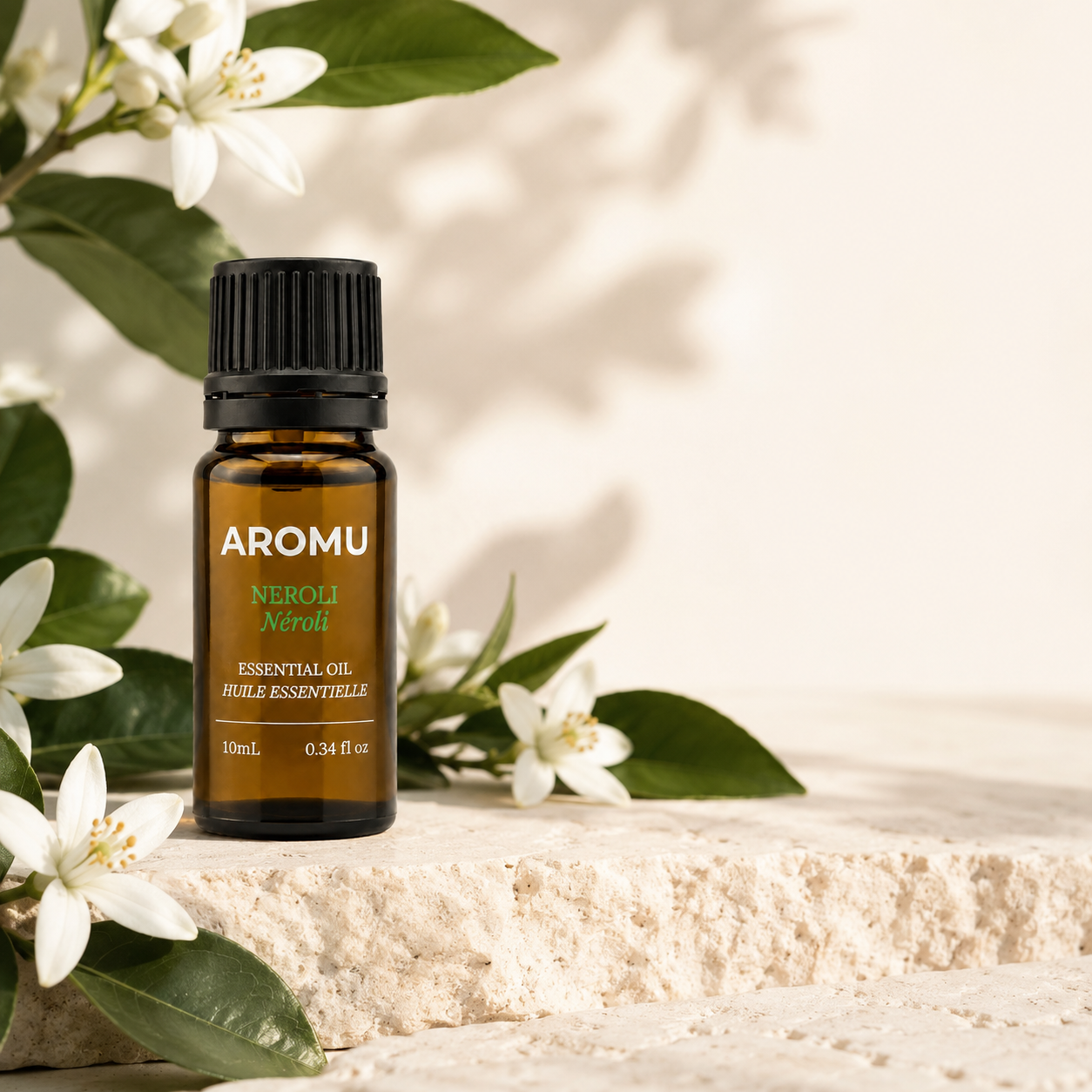 Neroli Essential Oil with white orange blossoms